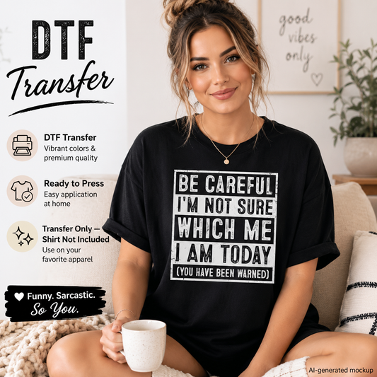 A woman sits on a couch wearing a black T-shirt with a large white graphic text that reads 'BE CAREFUL I'M NOT SURE WHICH ME I AM TODAY (YOU HAVE BEEN WARNED)'. The left side of the image contains promotional text for 'DTF Transfer' with icons and descriptions, and the background shows a cozy living room setting.