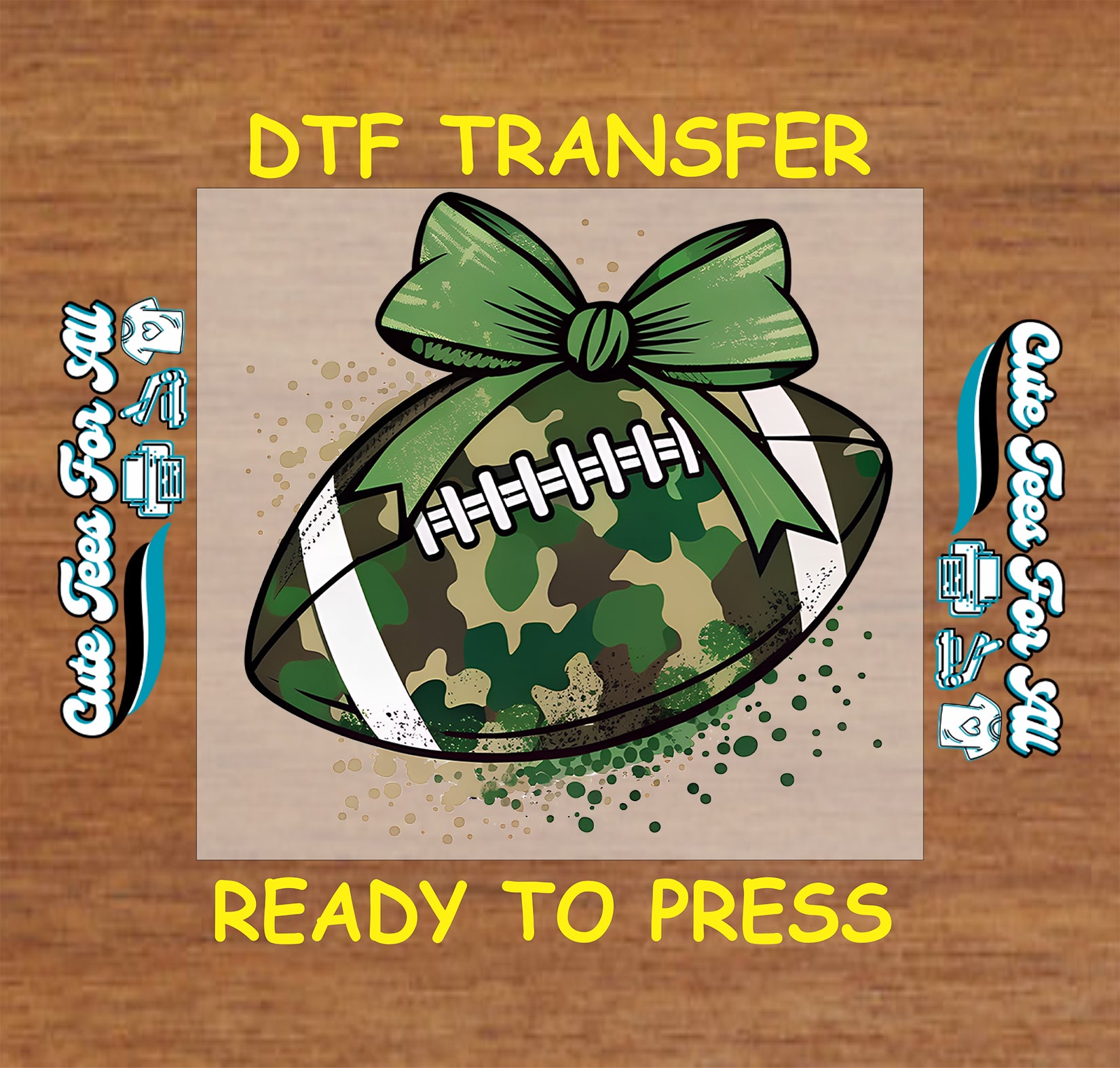 A digital graphic design for a football transfer featuring a green camouflage patterned football with a green ribbon bow, set against a light beige square on a brown wood-textured background. The text 'DTF TRANSFER' is written at the top and 'READY TO PRESS' at the bottom, with decorative text on both sides.