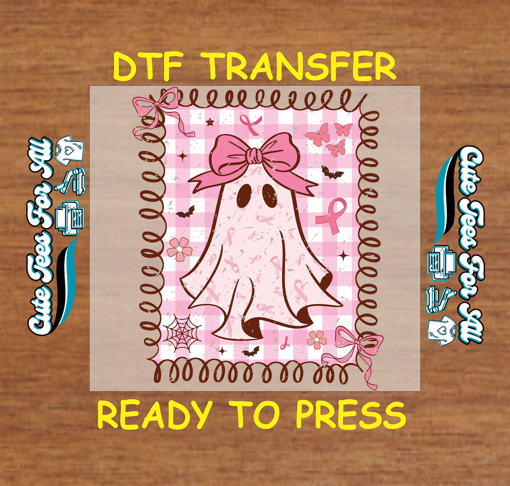 A DTF transfer design preview featuring a cute cartoon ghost with a pink bow on a pink gingham background, surrounded by Halloween motifs like bats, spiders, and butterflies. The design is presented on a beige transfer sheet mockup over a brown wood-grain background, with yellow text reading 'DTF TRANSFER' and 'READY TO PRESS'.