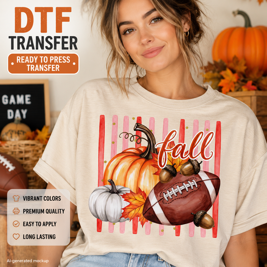 A woman wearing a cream-colored t-shirt with a fall-themed football graphic, set against a cozy autumn background with pumpkins and fall leaves. The image includes promotional text overlays for a DTF transfer product.