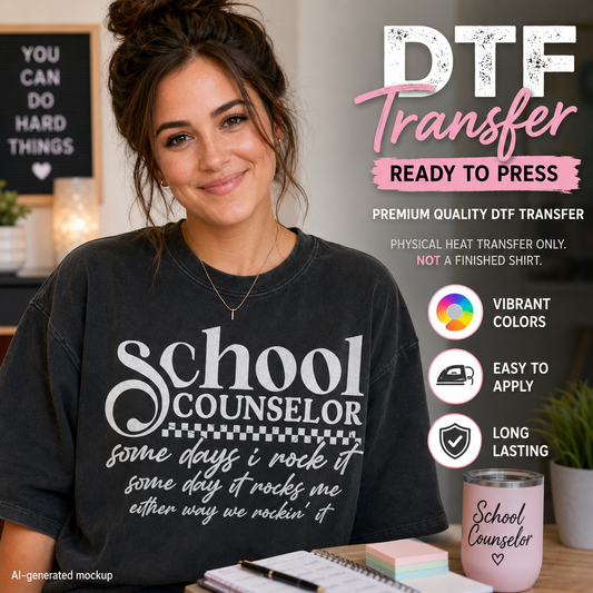 A woman wearing a black graphic T-shirt with the words 'School Counselor' in white script and cursive text below, shown in a styled indoor setting with promotional text overlays about DTF transfer. A matching pink tumbler is also visible on the desk.