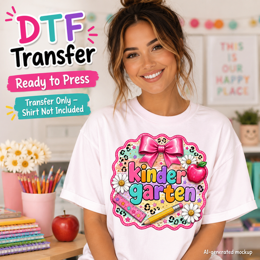A woman wearing a white T-shirt with a colorful 'Kinder Garten' DTF transfer graphic on the front, set in a bright, decorated classroom-like environment. Text overlays on the left read 'DTF Transfer', 'Ready to Press', and 'Transfer Only - Shirt Not Included'.