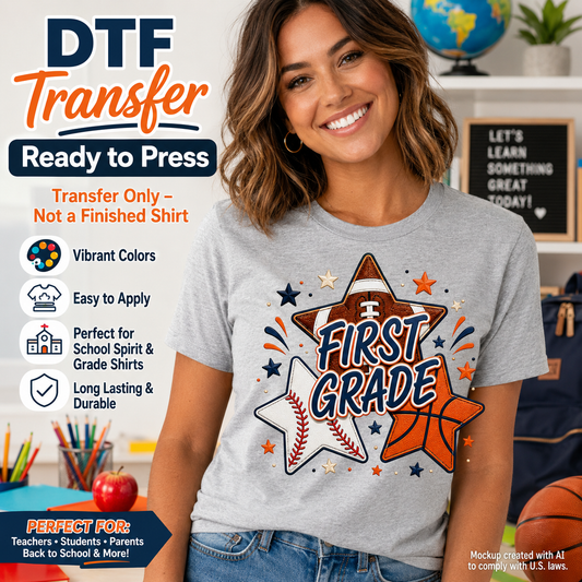 Woman wearing a gray T-shirt featuring a First Grade school spirit design with football, baseball, basketball, navy stars, and orange accents.