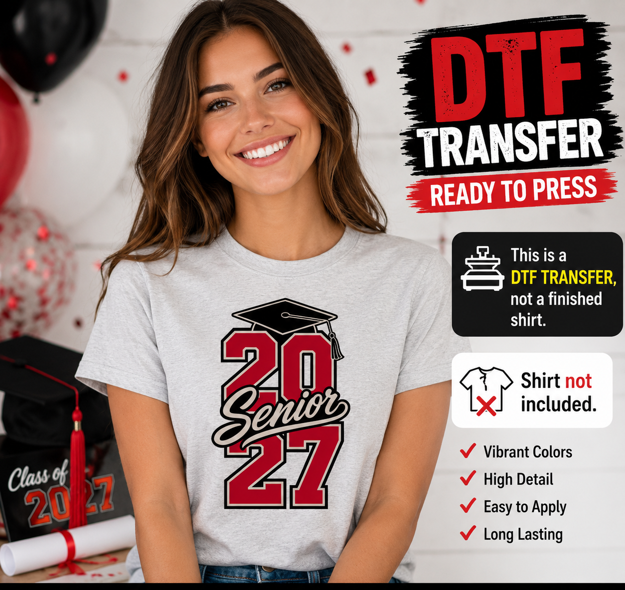 Woman wearing a gray T-shirt featuring a stacked red Senior 2027 graduation design with varsity numbers, black script lettering, and a graduation cap.