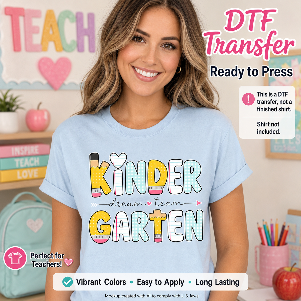 Woman wearing a light blue T-shirt featuring a colorful Kindergarten Dream Team design with pencil-inspired lettering, pastel gingham patterns, and heart accents.