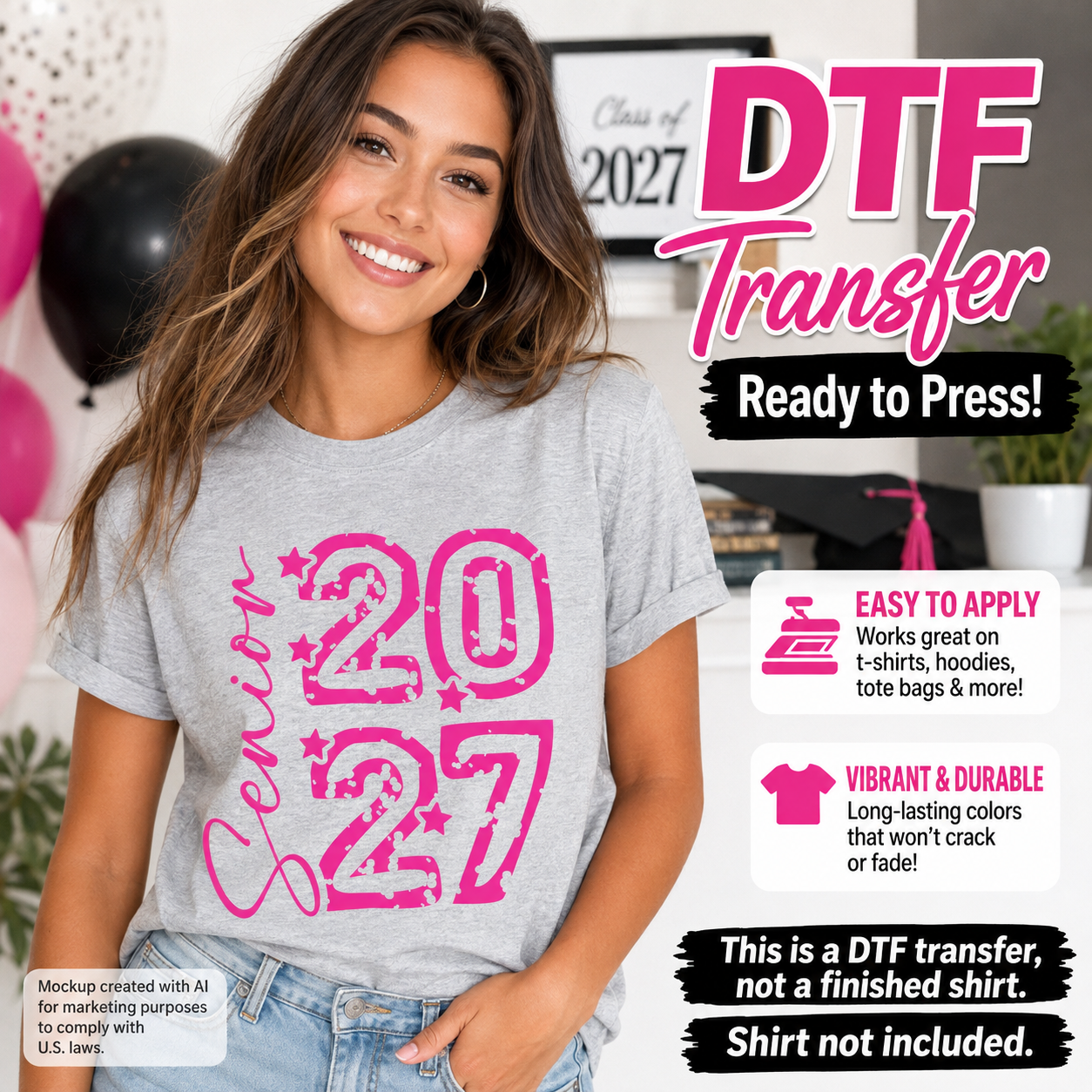 Woman wearing a gray T-shirt featuring a bright pink Senior 2027 graduation design with distressed numbers, script lettering, and star accents.