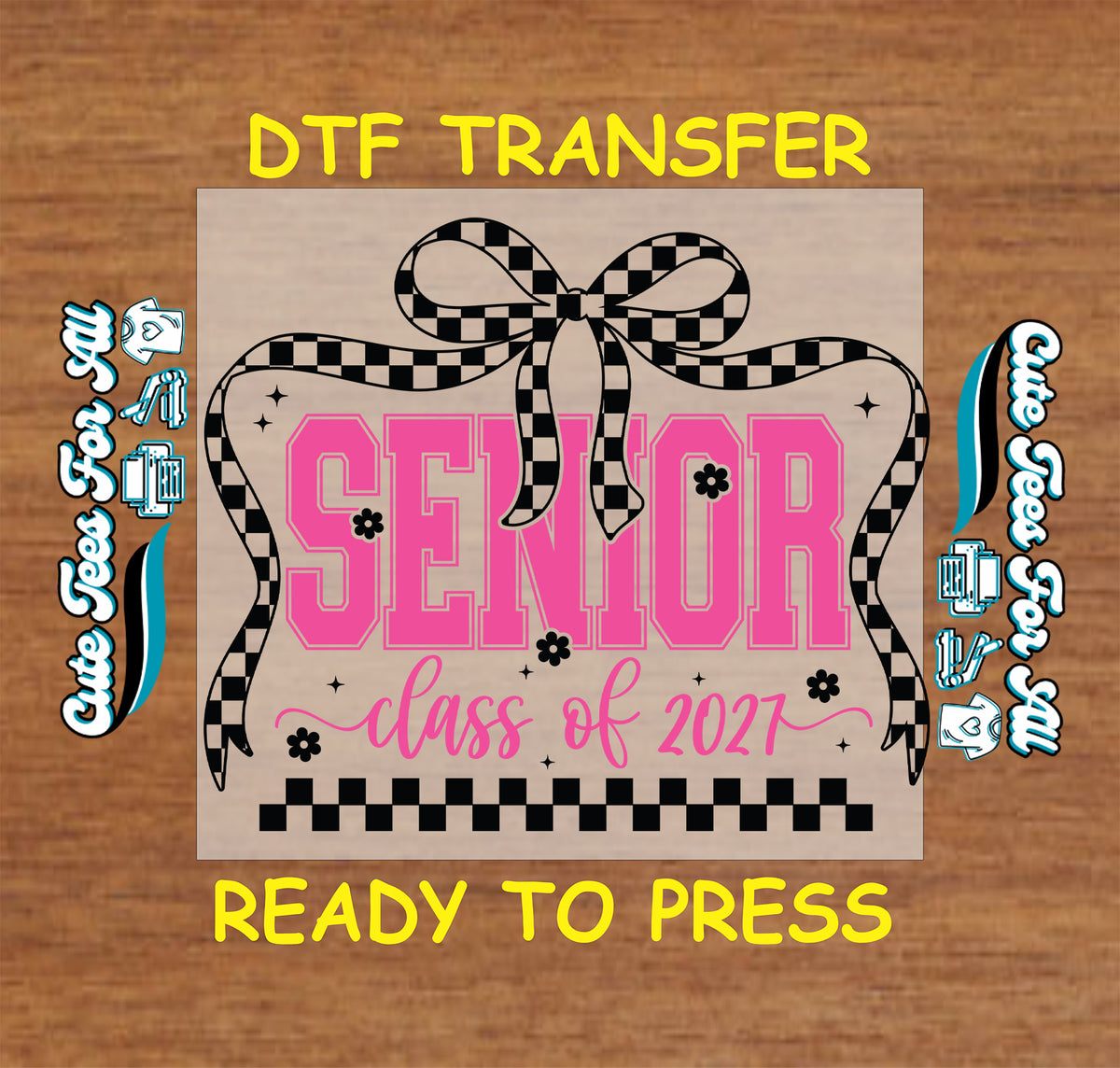 A DTF transfer design preview featuring a brown kraft-paper style square with a pink 'SENIOR class of 2021' graphic, black-and-white checkered ribbon bow, and small black flower motifs, surrounded by yellow 'DTF TRANSFER' and 'READY TO PRESS' text on a wood background.