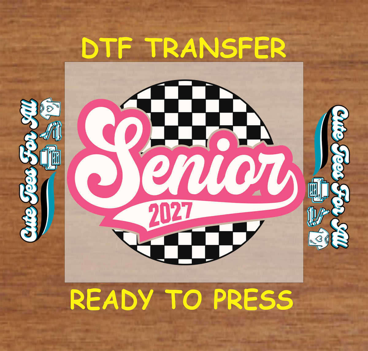 A DTF transfer design preview featuring a circular black-and-white checkered background with large pink and white 'Senior 2027' lettering, centered on a wood-textured background with yellow text reading 'DTF TRANSFER' and 'READY TO PRESS'.