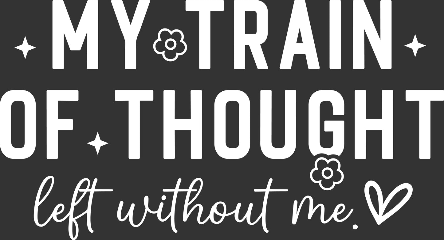 White typographic design on a dark charcoal background reading “MY TRAIN OF THOUGHT left without me.” with small flower and star accents.