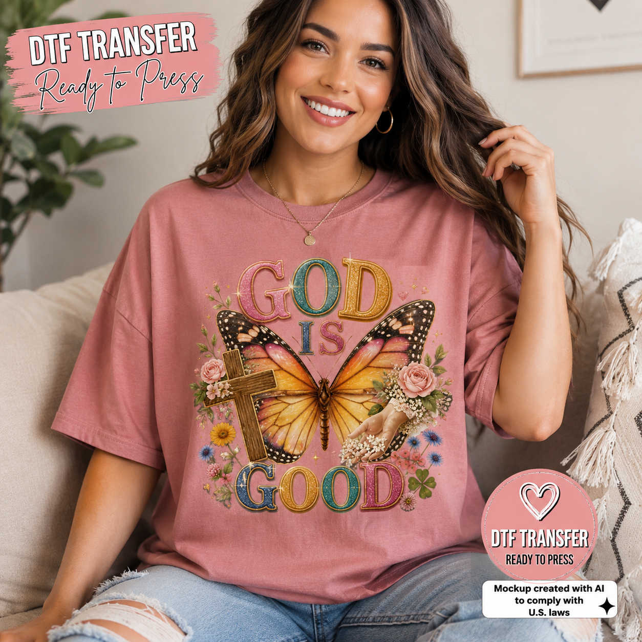 A woman wearing a dusty rose T-shirt with a colorful 'God Is Good' graphic featuring a butterfly, flowers, and a cross, sitting on a couch. Text overlays indicate 'DTF TRANSFER Ready To Press'.