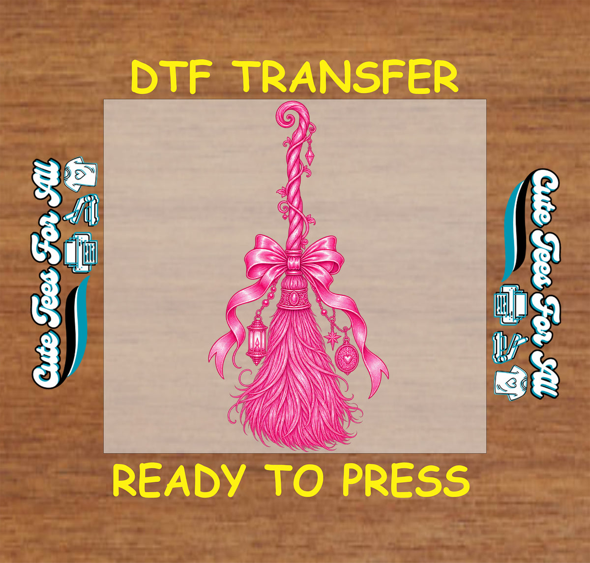 Feminine pink witch broom ready-to-press DTF transfer featuring an oversized bow, lanterns, charms, and whimsical Halloween details.