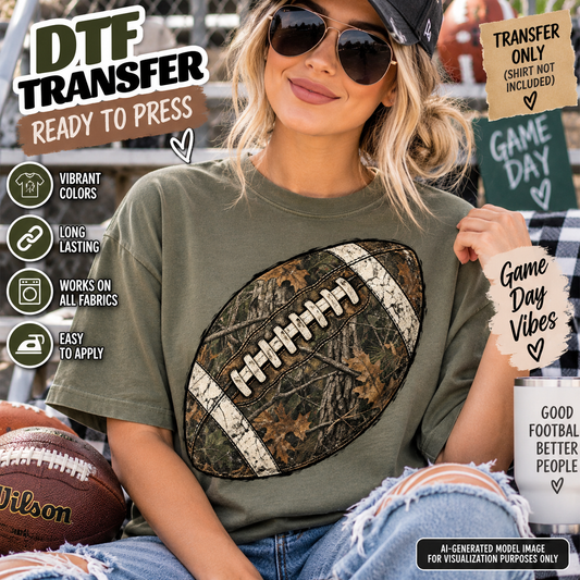 Camo football DTF transfer mockup featuring a woodland camouflage football with distressed white stripes and laces on an olive green T-shirt.