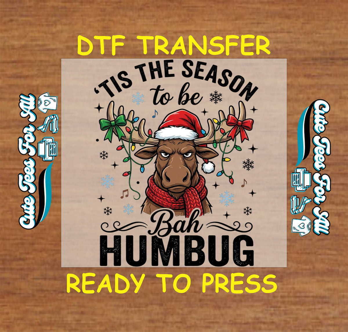 Tis the Season to Be Bah Humbug Christmas DTF transfer featuring a grumpy moose wearing a Santa hat and red scarf with holiday lights, bows and snowflakes.