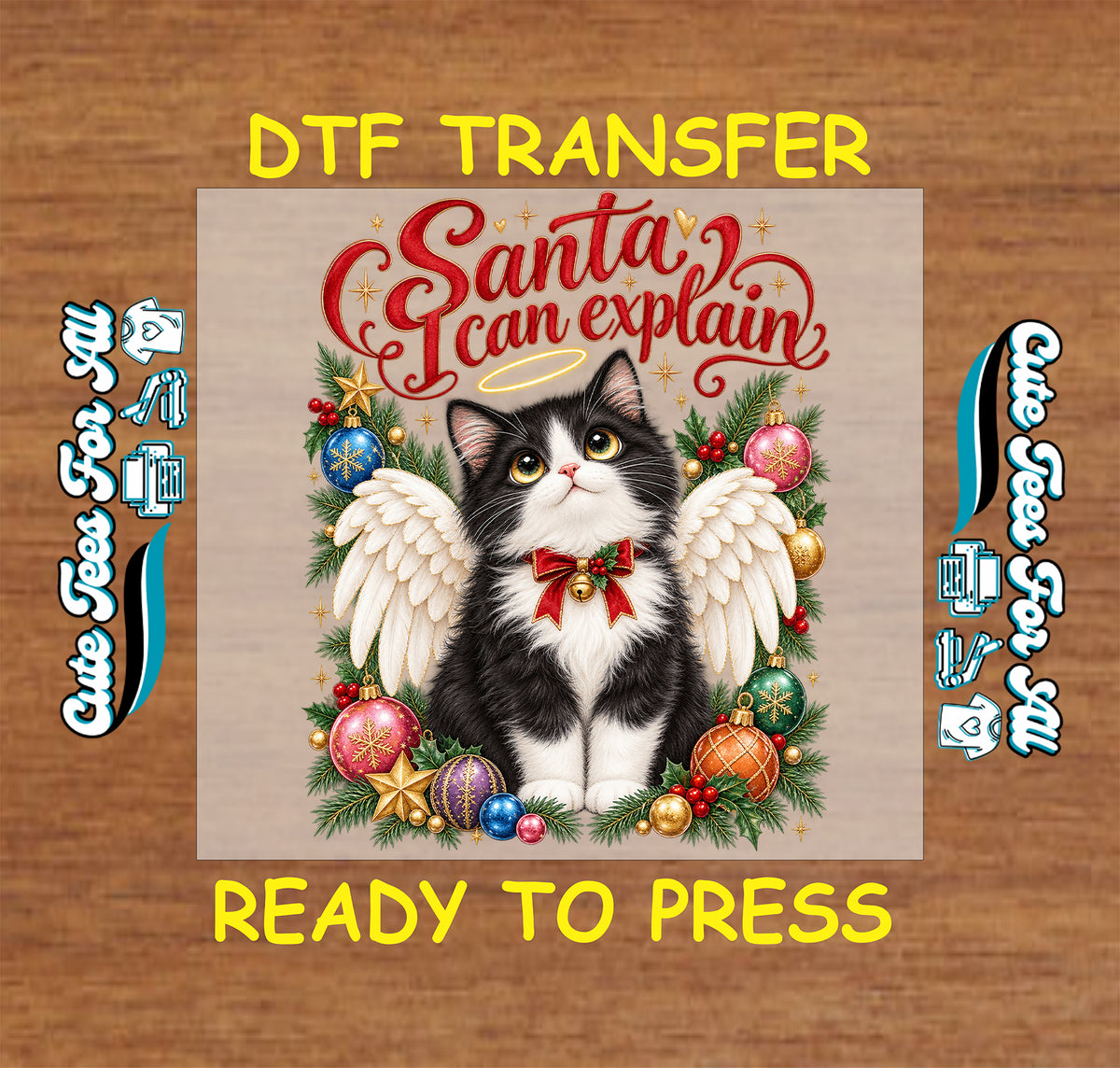 Black-and-white kitten with angel wings, a golden halo, and a red bow, surrounded by ornaments and greenery beneath “Santa, I can explain.”