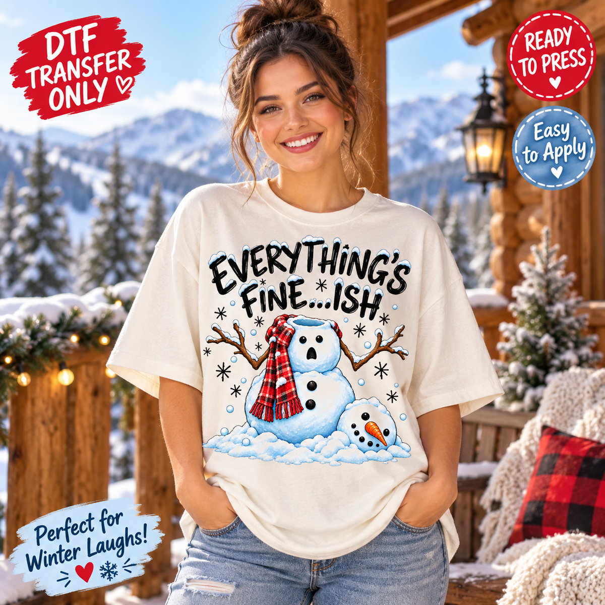 A woman wearing a cream-colored graphic t-shirt with a winter snowman design and the text 'EVERYTHING'S FINE.