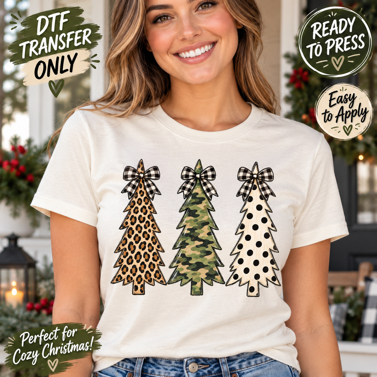 Woman in a cream tee modeling three Christmas tree DTF shapes with leopard, camouflage, and polka dot patterns topped with black gingham bows.