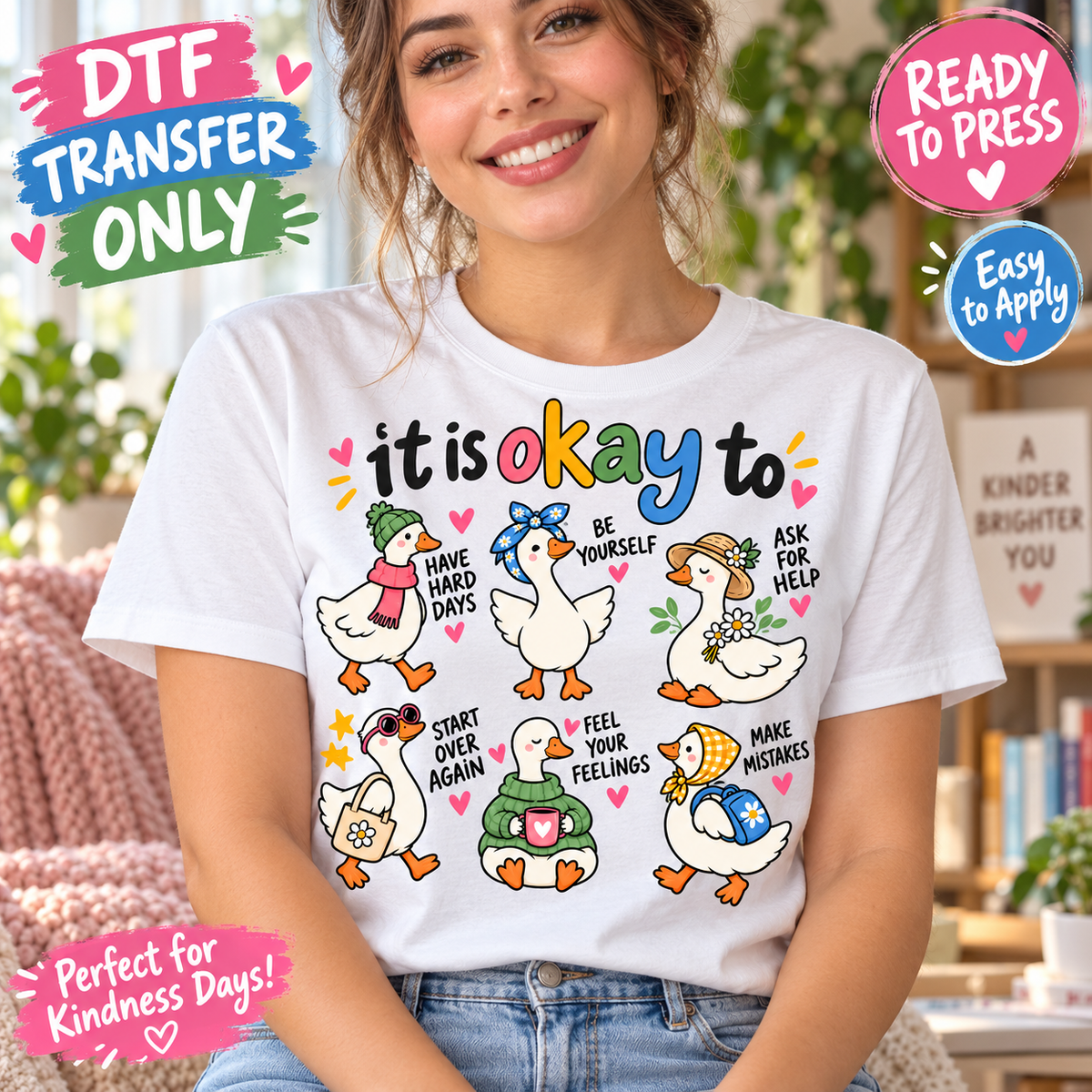 Woman in a white shirt showing It Is Okay lettering and six illustrated geese with encouraging affirmations; ready-to-press DTF transfer mockup.