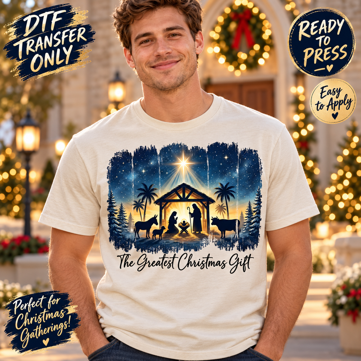 Man modeling a cream shirt with a blue nighttime nativity scene, bright star and The Greatest Christmas Gift wording; DTF transfer-only mockup.