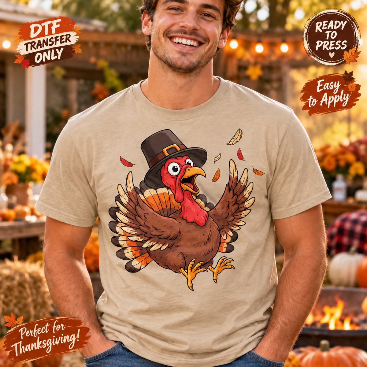 Man in a sand shirt displaying a cartoon Thanksgiving turkey wearing a black pilgrim hat.