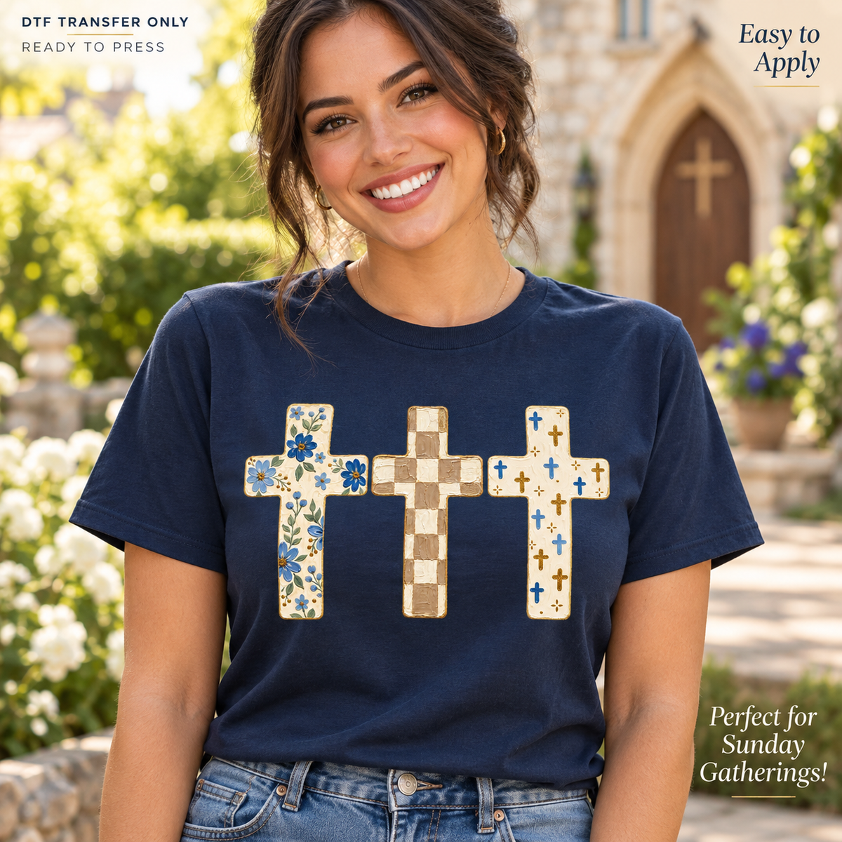 Woman in a navy shirt displaying three patterned crosses, including blue flowers, brown checkerboard, and small blue cross motifs.