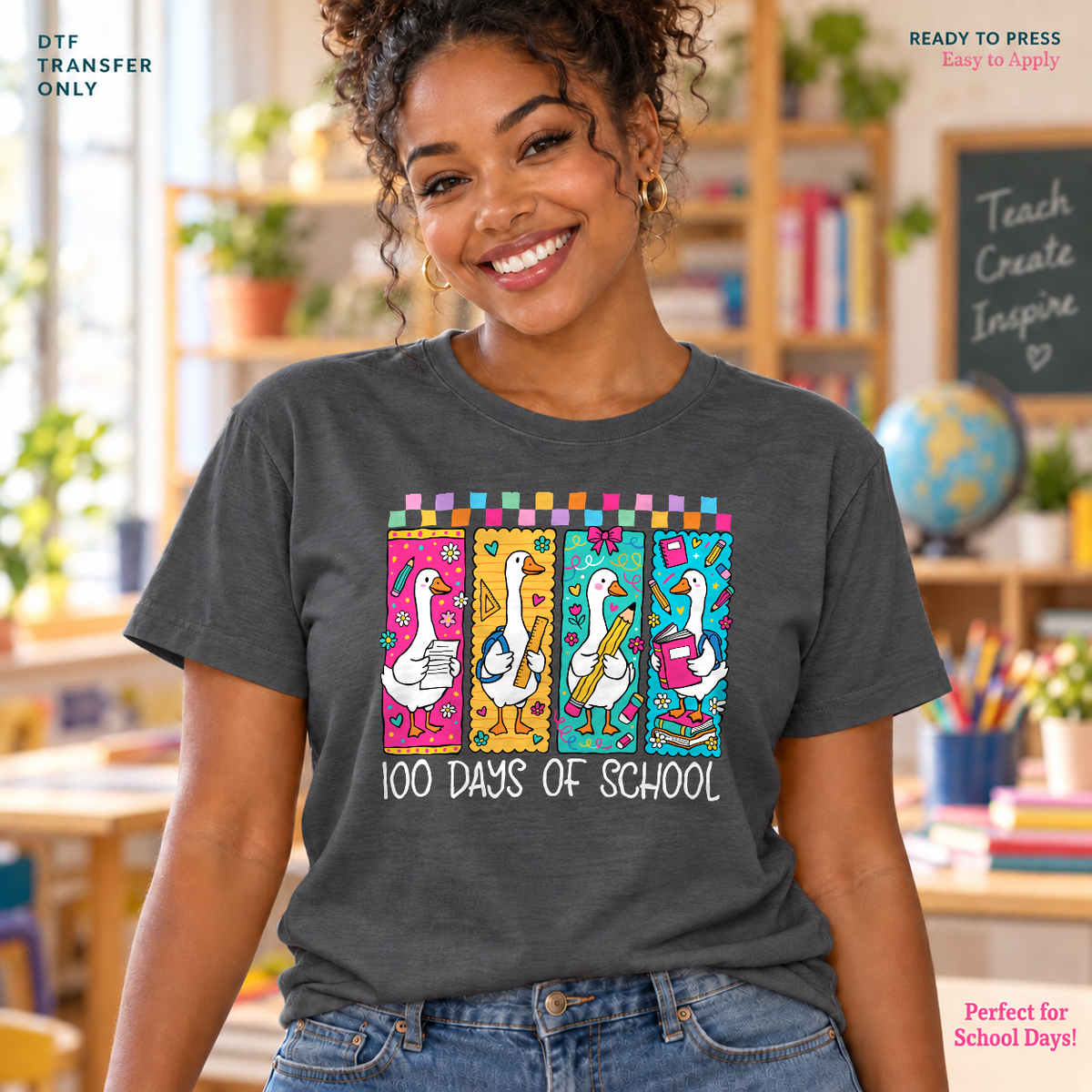 Lifestyle mockup of a woman wearing a charcoal shirt showing Four geese with books and school supplies in colorful panels above 100 Days of School. DTF transfer only; shirt not included.
