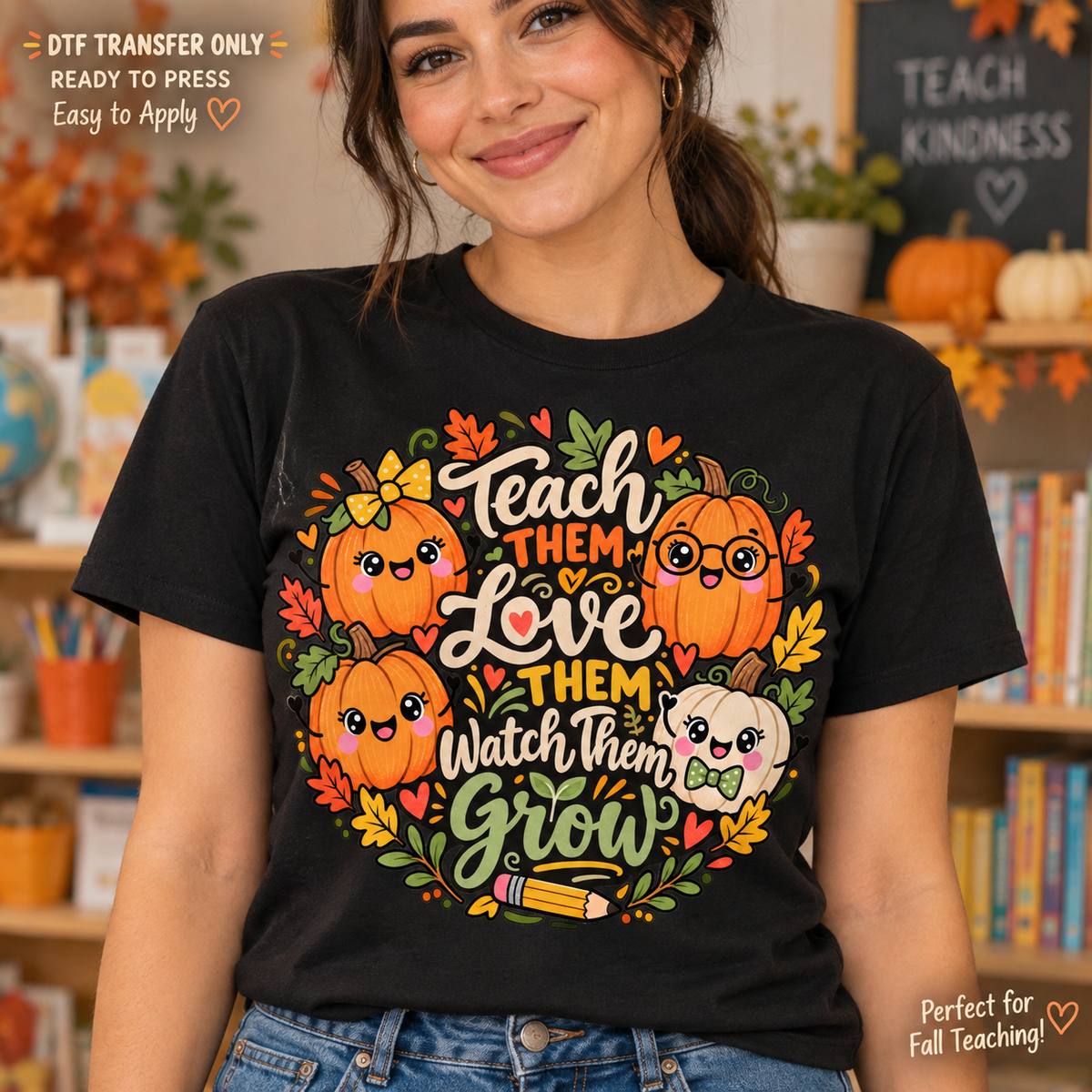 Lifestyle mockup of a woman wearing a black shirt showing Teach Them Love Them Watch Them Grow message with smiling pumpkins, glasses, and autumn leaves. DTF transfer only; shirt not included.