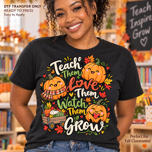 Lifestyle mockup of a woman wearing a black shirt showing Teach Them Love Them Watch Them Grow lettering with smiling pumpkins and a harvest wagon. DTF transfer only; shirt not included.