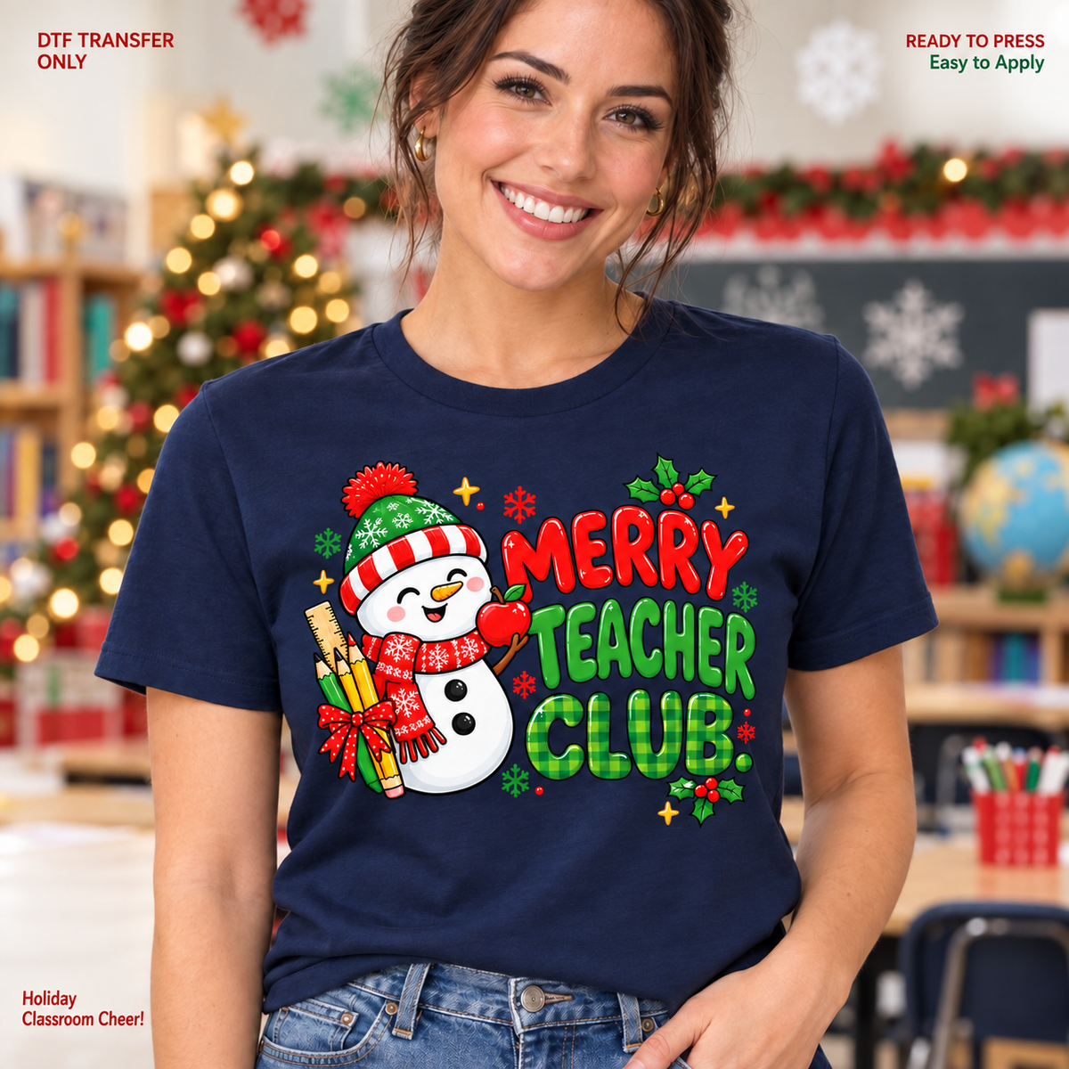 Lifestyle mockup of a woman wearing a navy shirt showing Merry Teacher Club lettering beside a snowman in a striped scarf and winter hat. DTF transfer only; shirt not included.