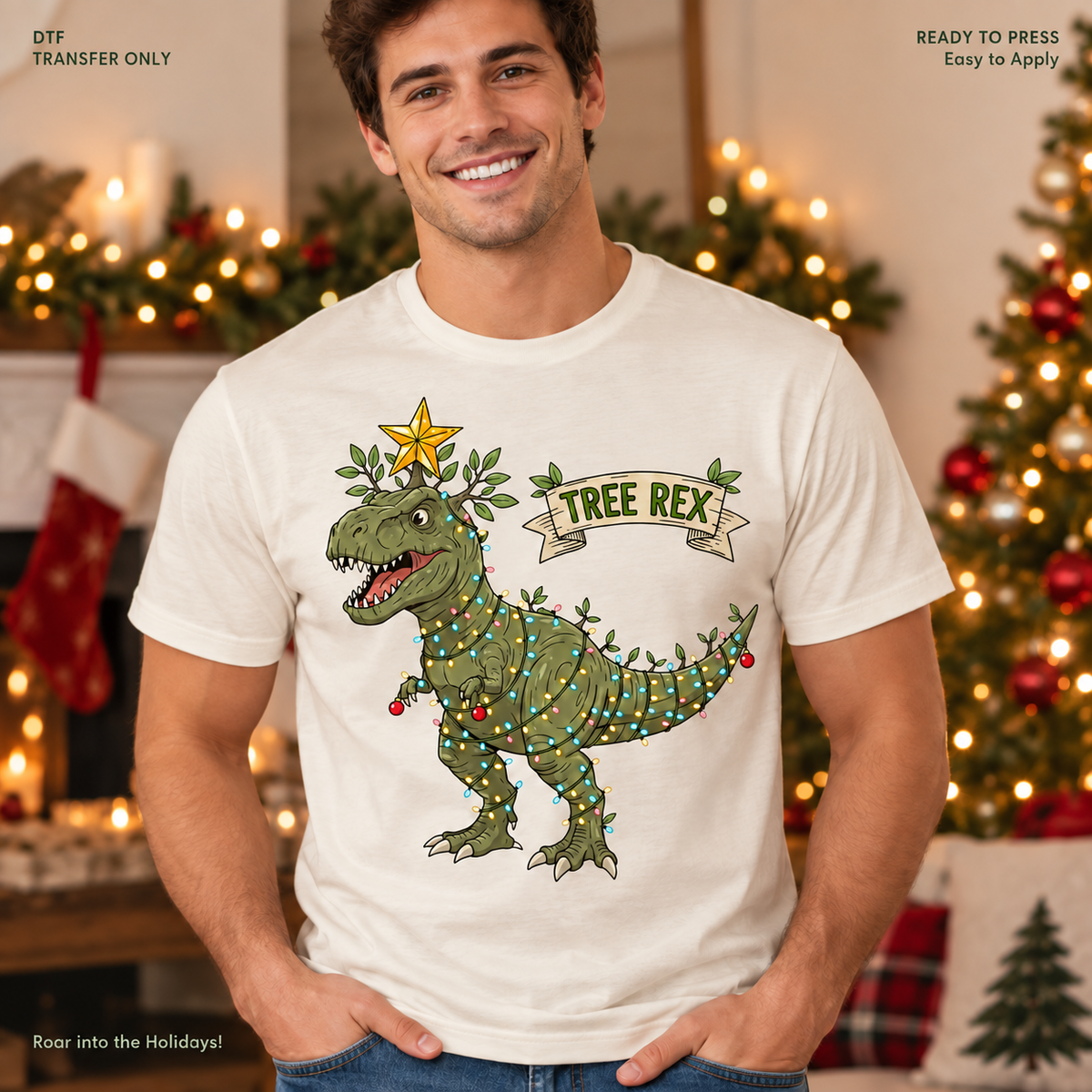 Lifestyle mockup of a man wearing a white shirt showing Green T-rex wrapped in Christmas lights with a star and Tree Rex banner. DTF transfer only; shirt not included.