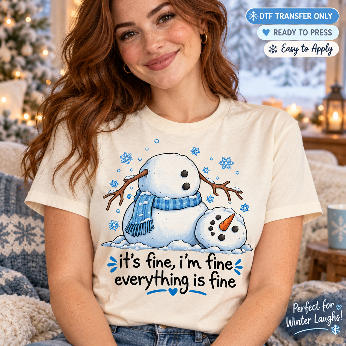 Lifestyle mockup of a woman wearing a cream shirt showing Snowman with separated head, blue scarf, snowflakes, and It's Fine I'm Fine Everything Is Fine wording. DTF transfer only; shirt not included.