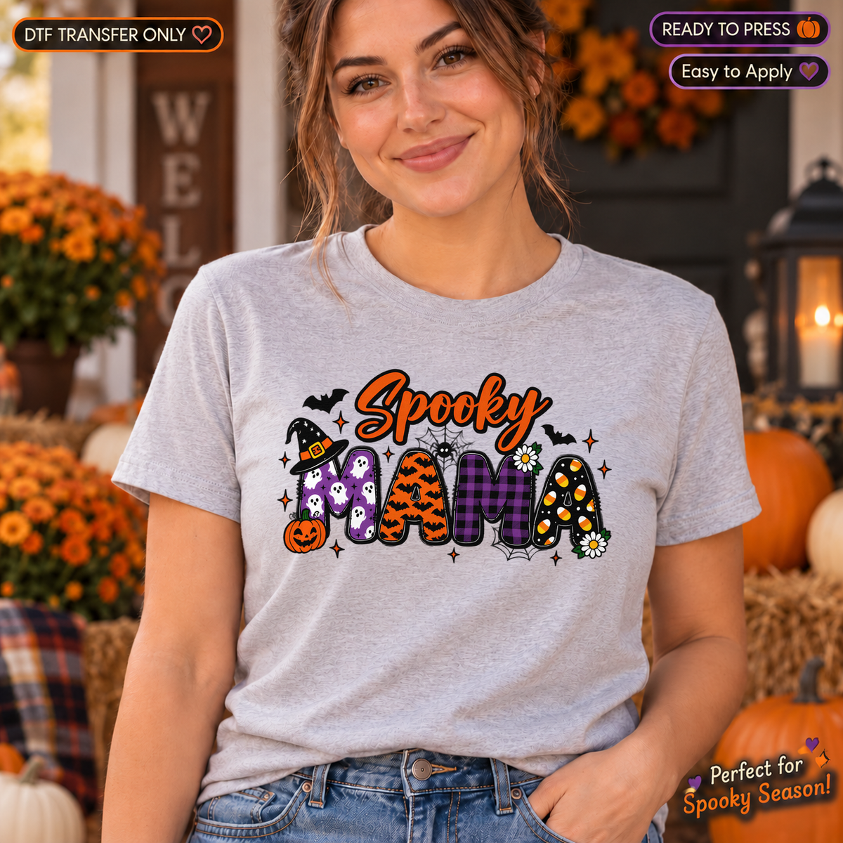 Woman in a heather gray shirt with orange Spooky script and patterned Mama lettering accented with Halloween details.