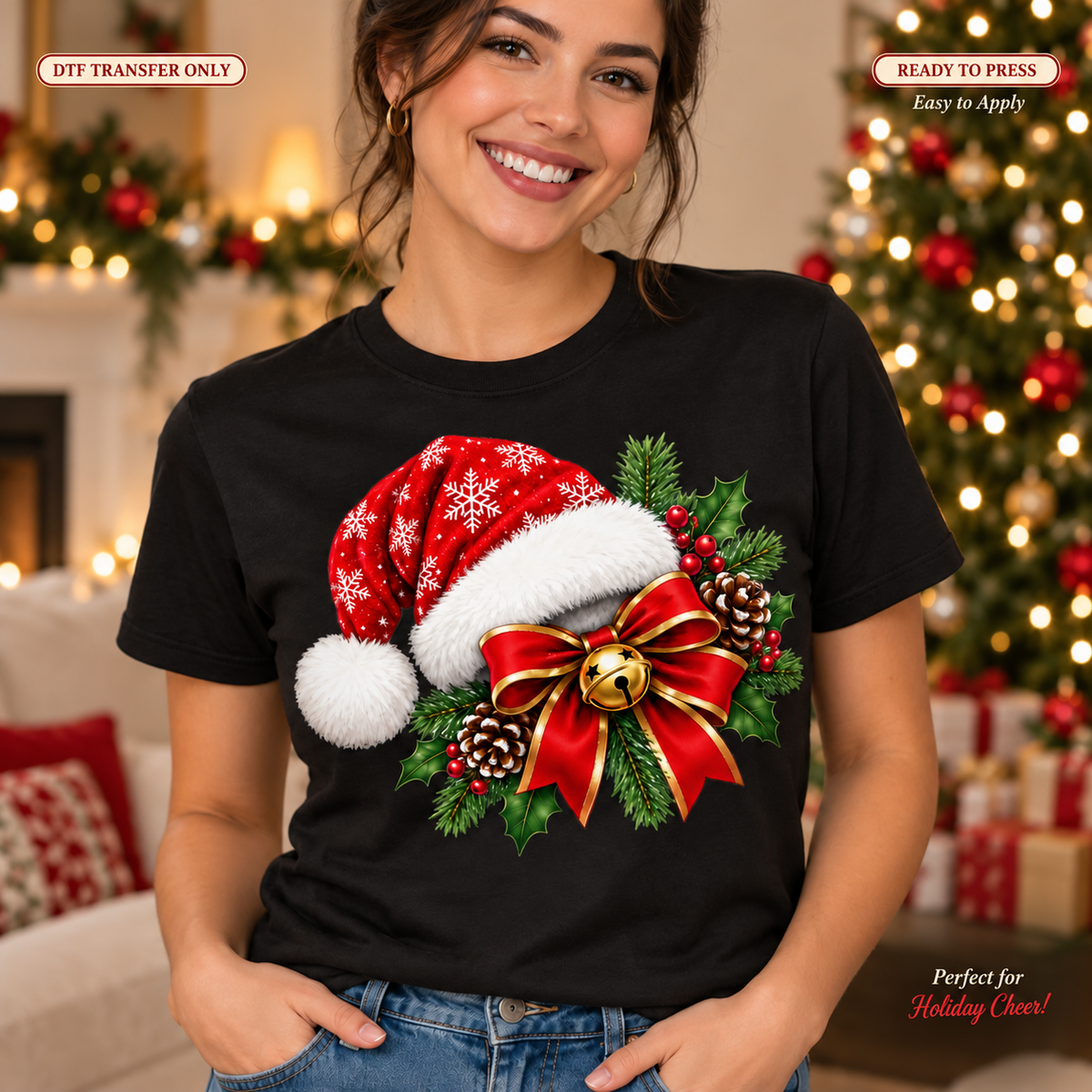Woman in a black shirt with a red Santa hat, red and gold bow, printed golden bell, evergreen branches and pinecones.