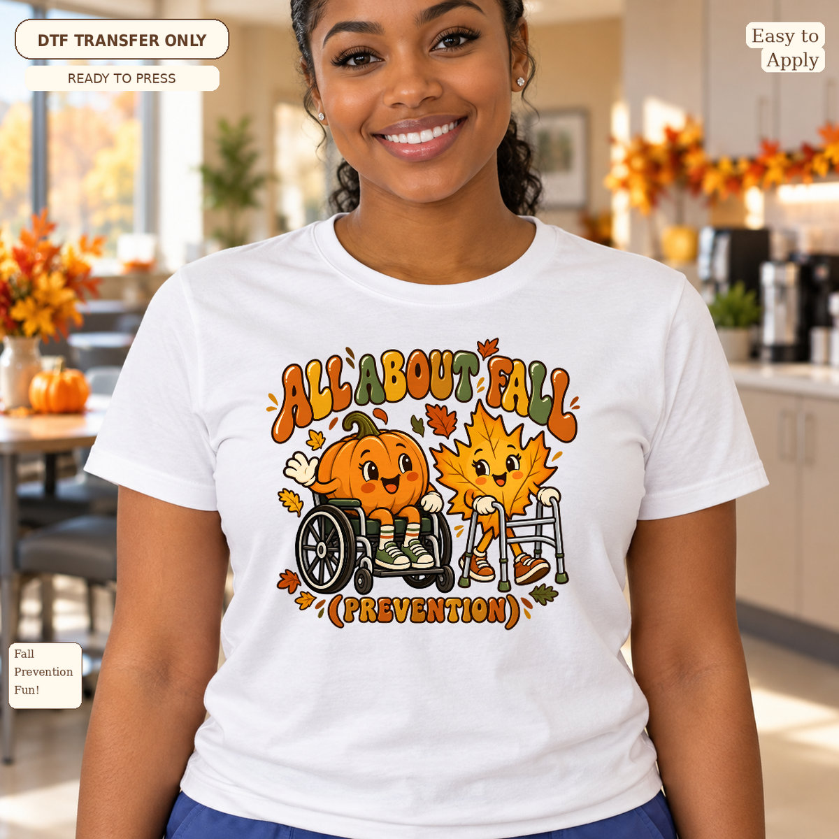 Woman wearing a white tee with All About Fall Prevention text, a pumpkin in a wheelchair and a leaf with a walker.
