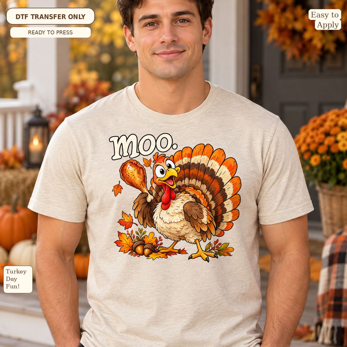 Man in a cream tee with a cartoon turkey, autumn leaves and the word moo above it.
