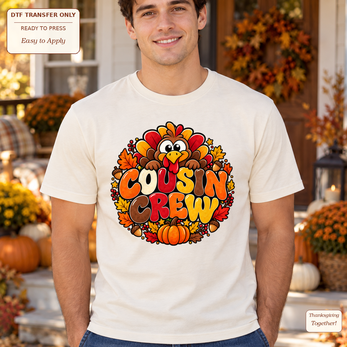 Man wearing a cream tee with orange and red Cousin Crew lettering, a smiling turkey, leaves and pumpkins.