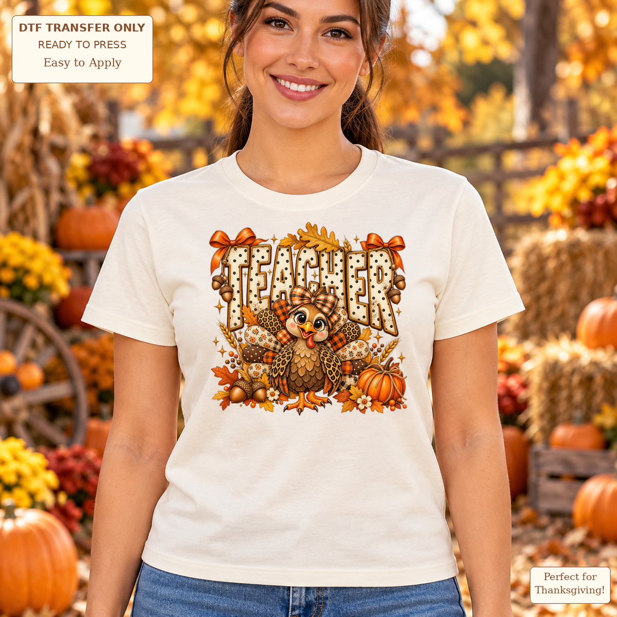 Woman wearing a cream tee with TEACHER lettering, autumn bows, a smiling turkey, pumpkins and leaves.