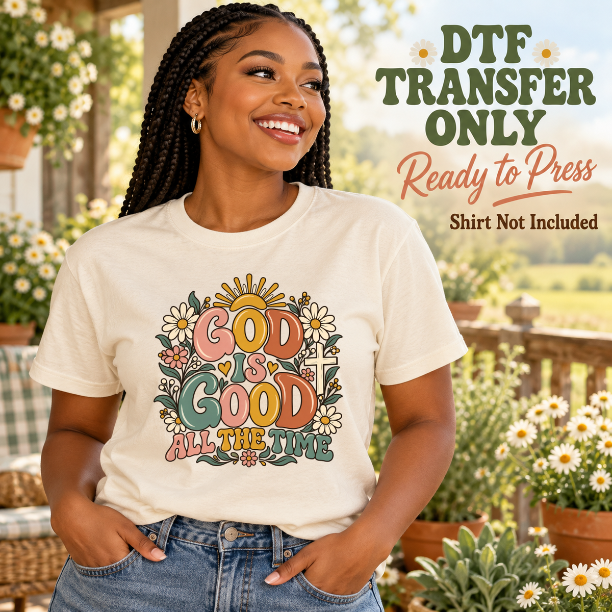 Woman in a cream tee with retro God Is Good All the Time lettering, daisies and a rising sun.