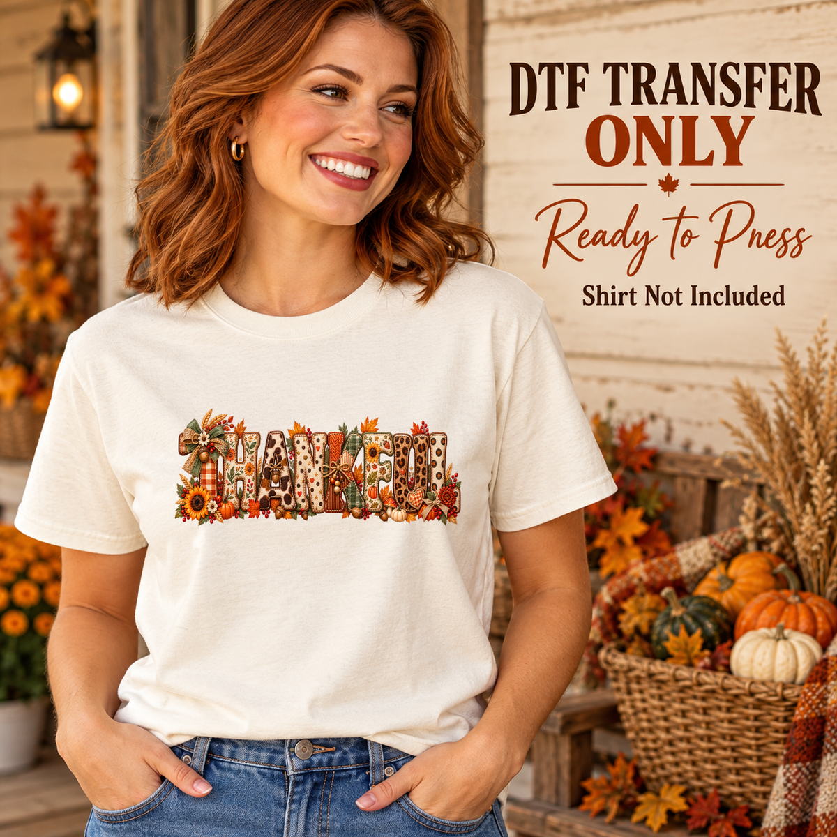 Woman wearing a cream tee with THANKFUL letters in mixed autumn patterns with seasonal flowers and pumpkins.