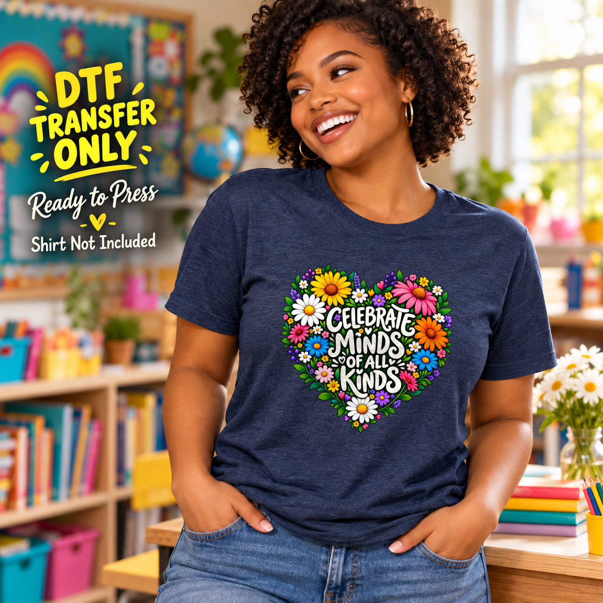 Woman wearing a navy tee with Celebrate Minds of All Kinds text inside a heart formed from colorful flowers.