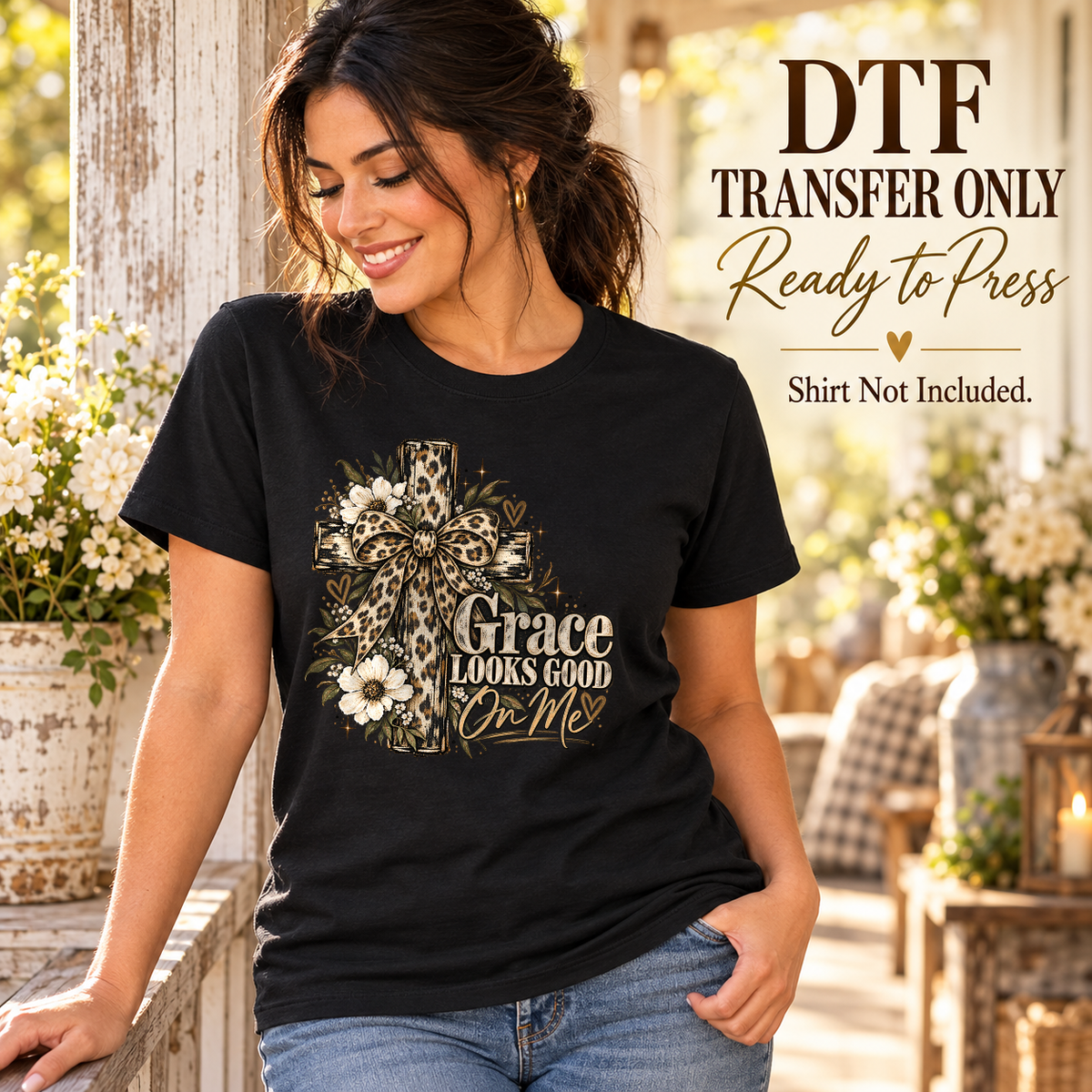 Woman in a black tee with Grace Looks Good on Me lettering, a leopard-pattern cross, bow and flowers.