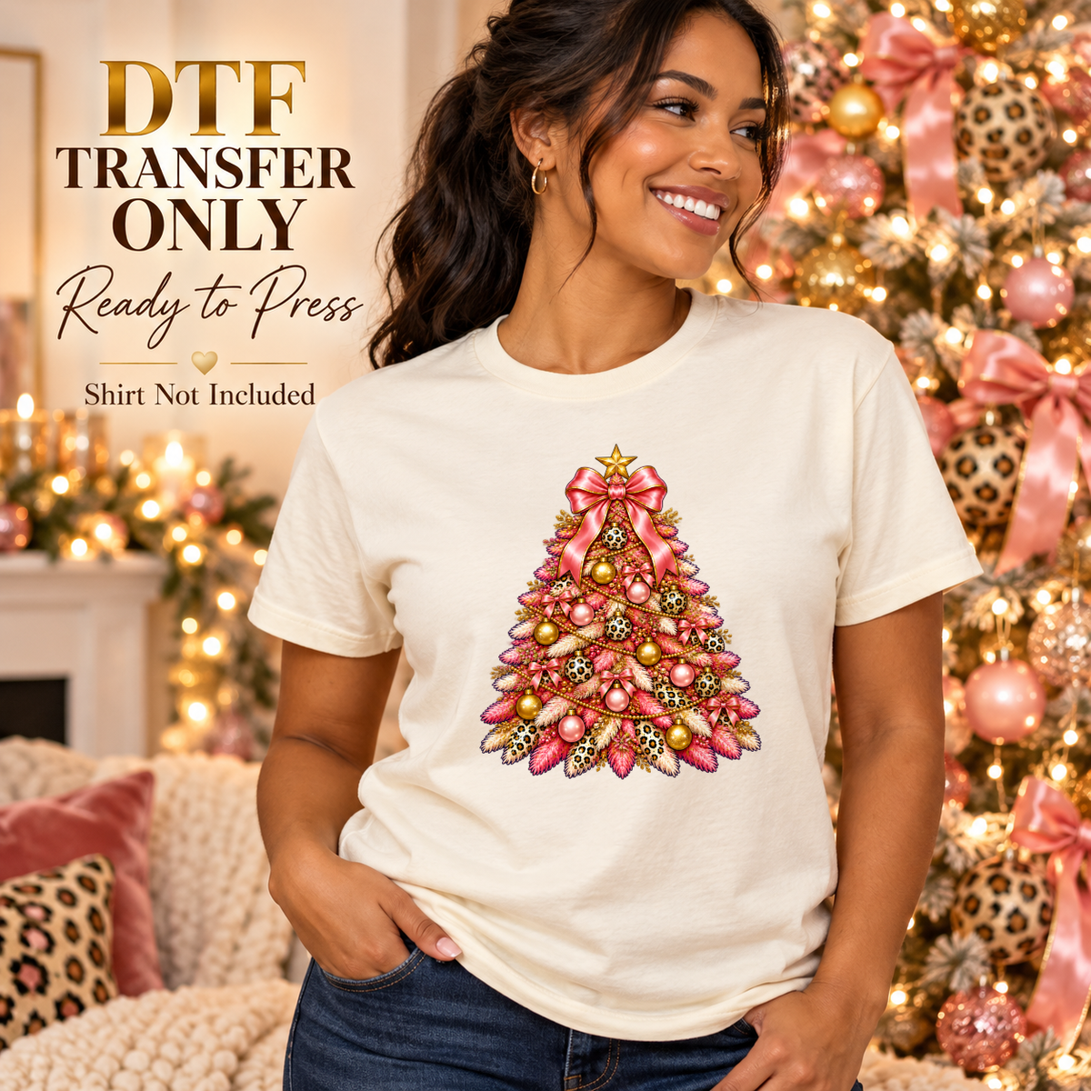 Woman in a cream tee with a pink and gold Christmas tree, leopard-print ornaments and a large pink bow.
