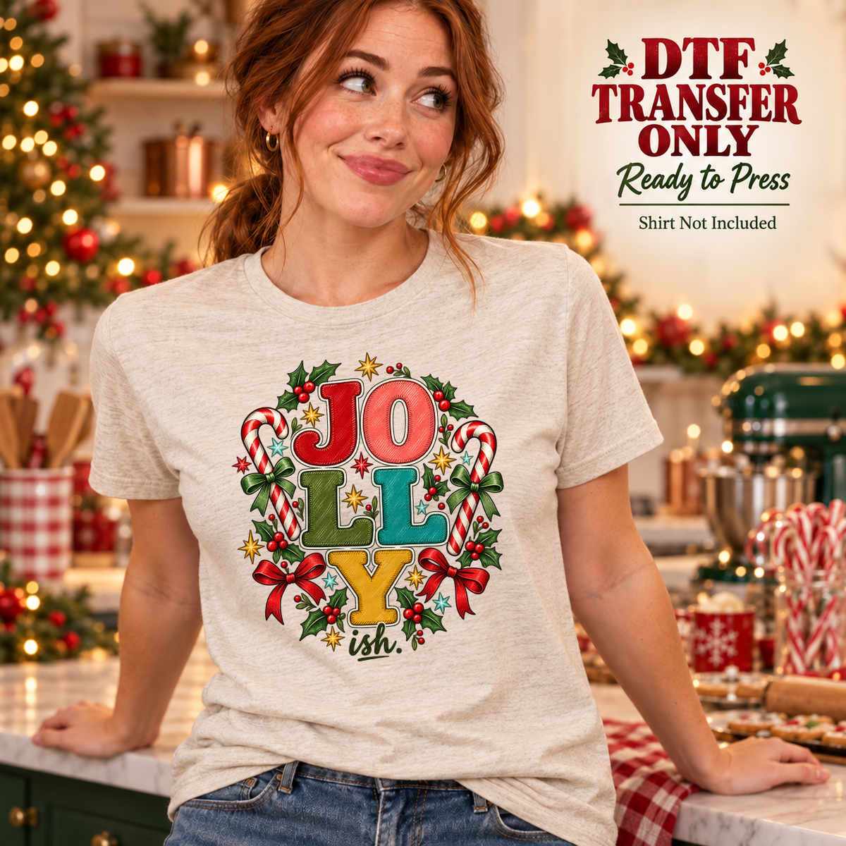 Woman in a light gray tee with stacked JOLLY letters, a small ish, candy canes, bows and holly.