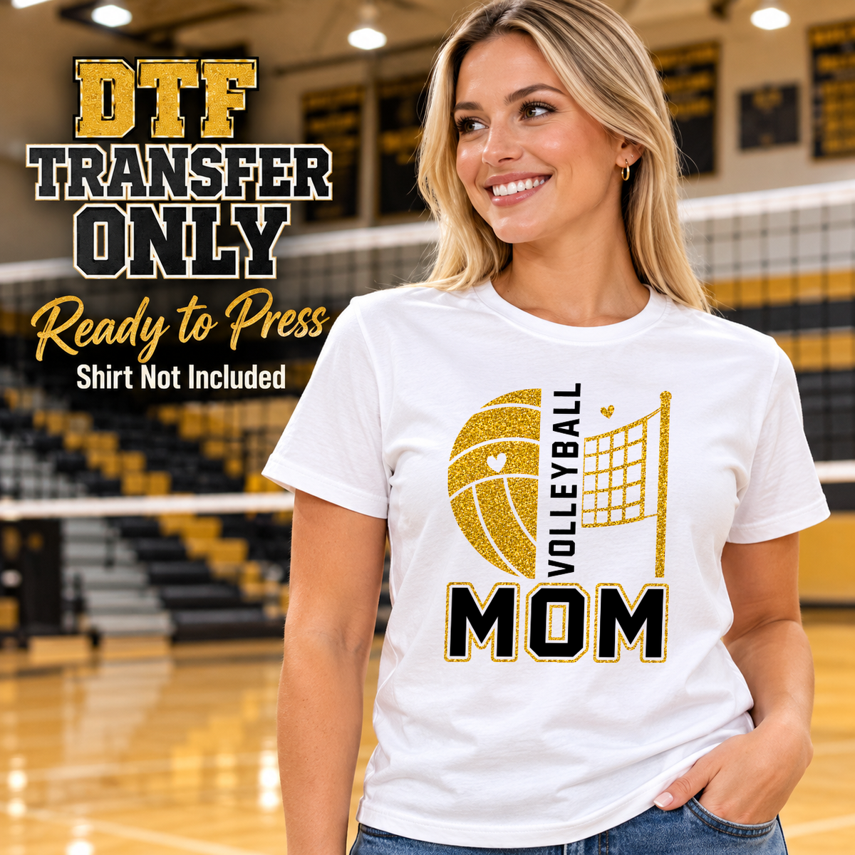 Woman wearing a white tee with a gold glitter-effect volleyball and net, vertical VOLLEYBALL text and black MOM letters.
