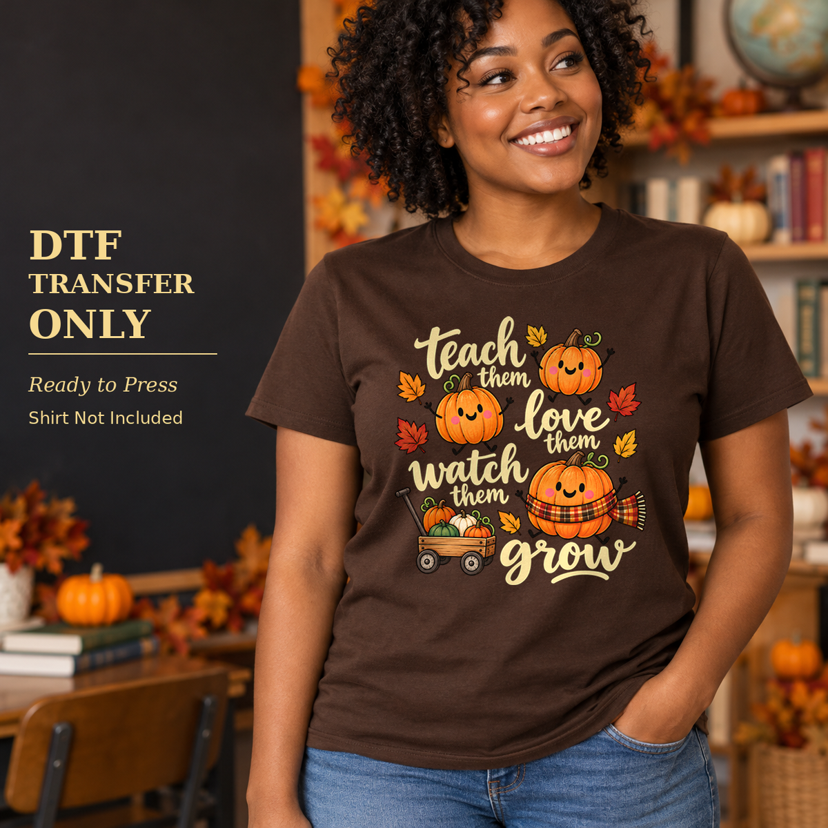 Woman wearing a brown shirt with light Teach Them Love Them Watch Them Grow lettering and orange pumpkins in a classroom.
