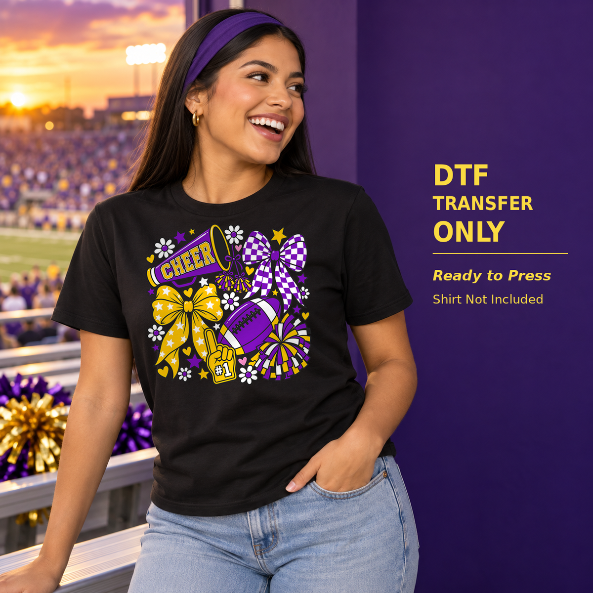 Woman in a black shirt with a purple-and-gold cheer megaphone, patterned bows, and pom-pom details at a stadium.