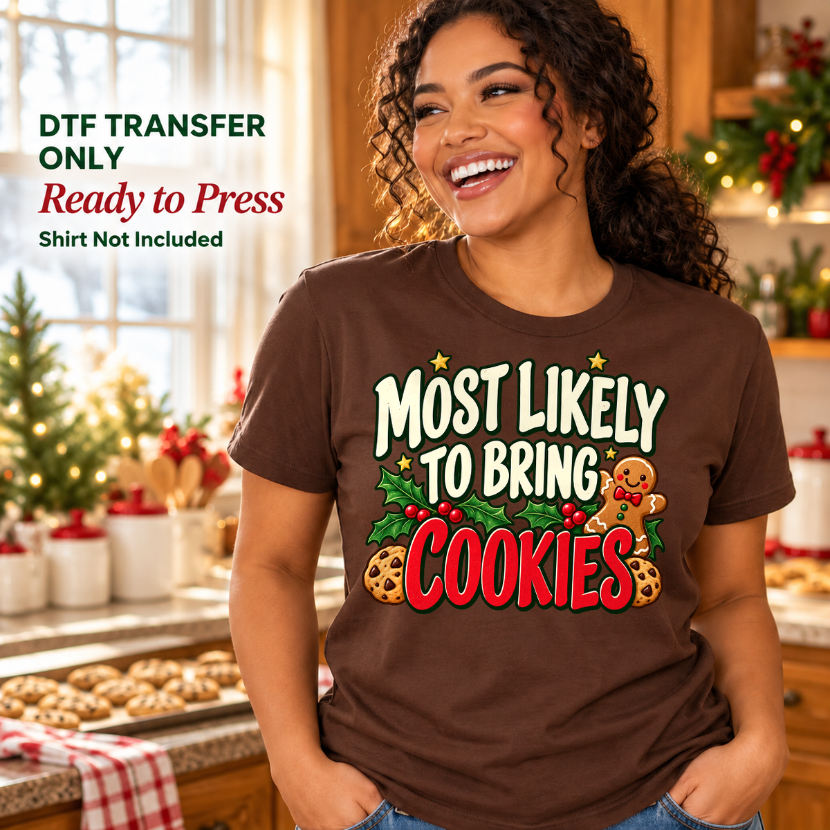 Woman wearing a brown Most Likely to Bring Cookies shirt with gingerbread and cookie details in a Christmas kitchen.