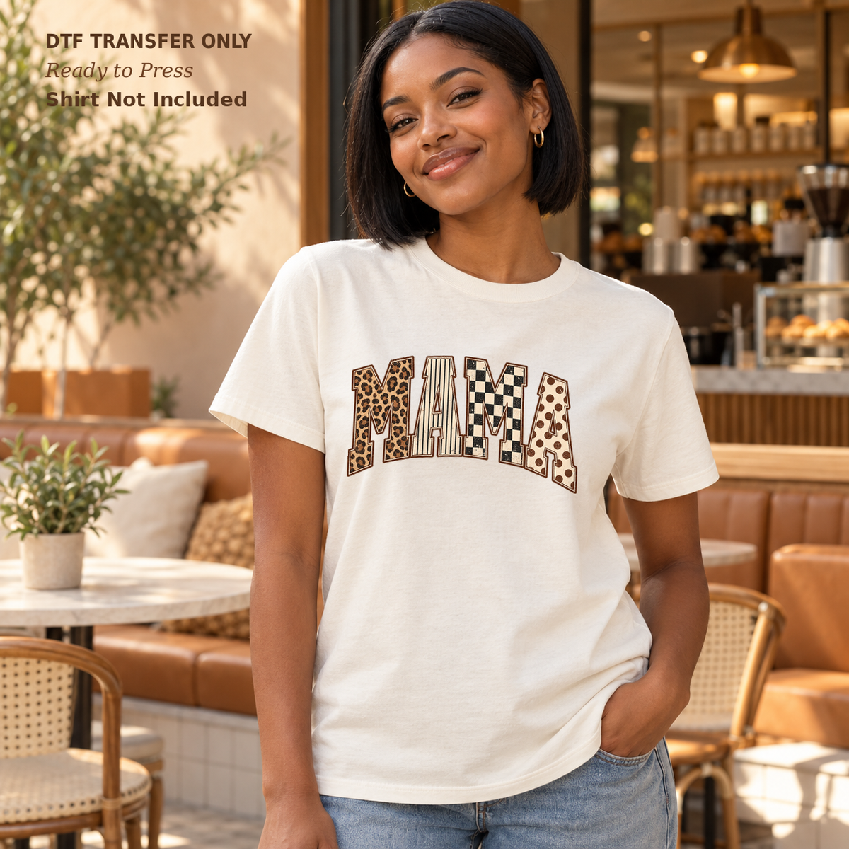 Woman in a white tee displaying arched MAMA lettering with leopard and checkerboard patterns.