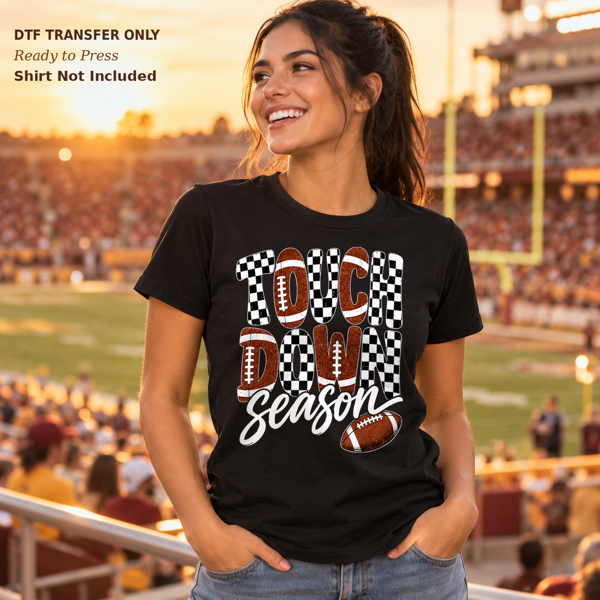 Woman in a black tee with Touchdown Season lettering, checkerboard blocks and football accents.