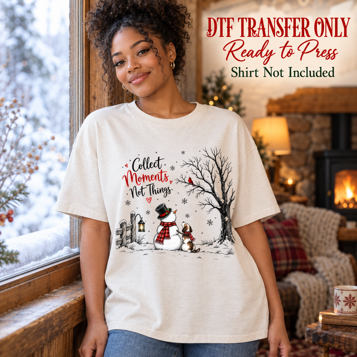 Woman in a white tee with Collect Moments Not Things text and a snowy scene with a snowman and bare tree, labeled transfer only.