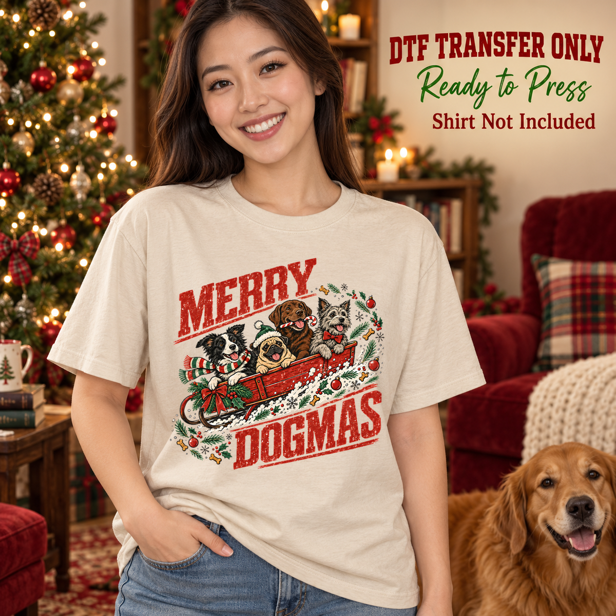 Woman in a cream tee with Merry Dogmas lettering and Christmas dogs riding in a red sleigh, labeled DTF transfer only.